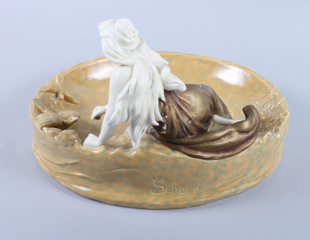 A Honenstein Art Nouveau table centre, formed as a girl sitting by a pond feeding a duck (damages - Image 5 of 8