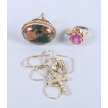 A 9ct gold and moss agate ring, an 18ct gold dress ring set pink stone, and a 14ct gold crucifix set