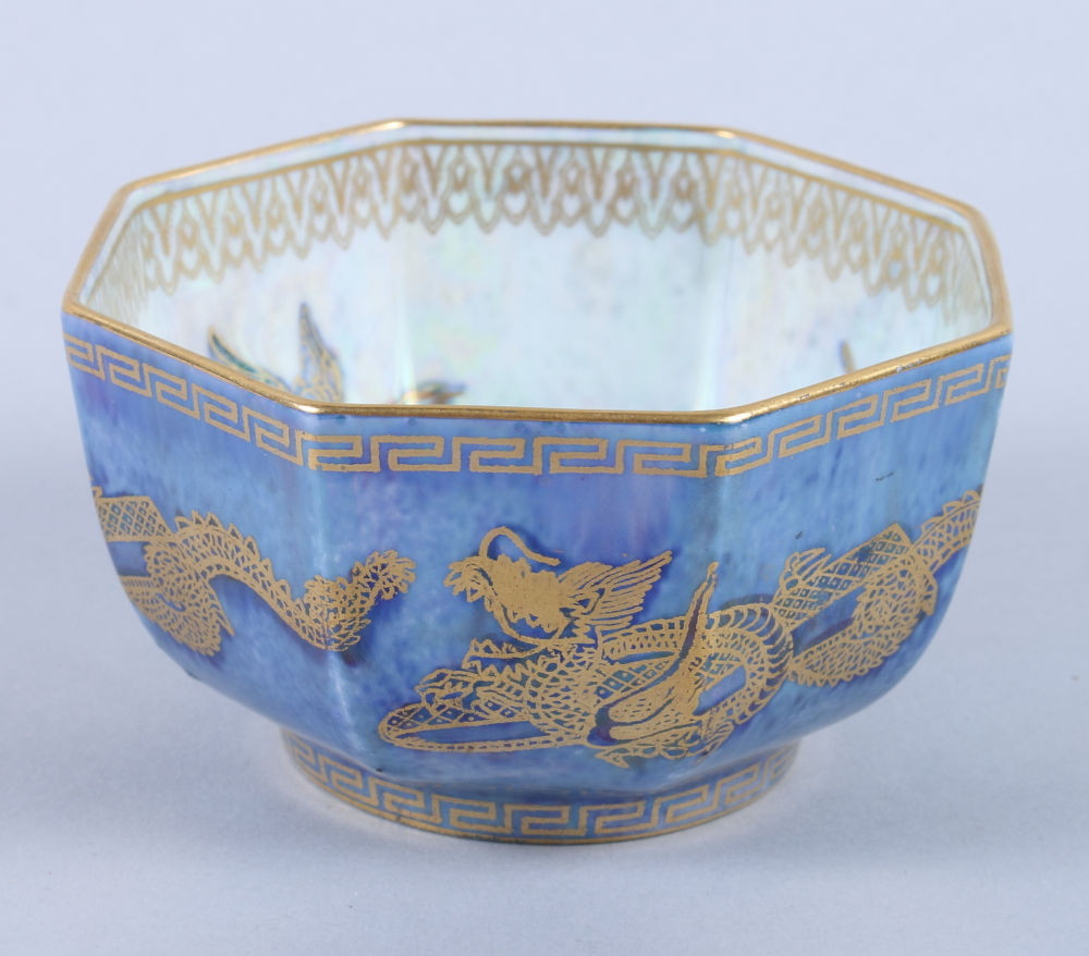 A Wedgwood octagonal lustre porcelain bowl, decorated birds and dragons, with Greek key border, gilt