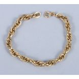 An 18ct gold, hollow link bracelet, stamped 750, 6.4g