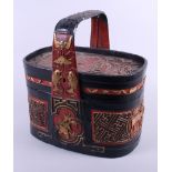 A Chinese lacquered wedding basket with applied figure and floral decoration, 12 1/2" long