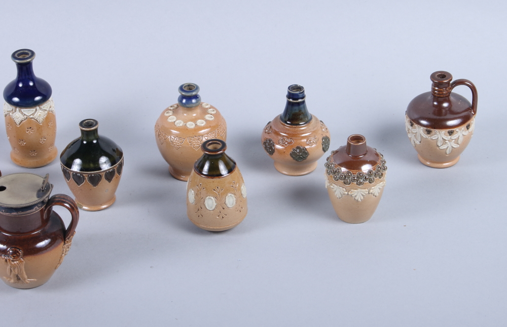A collection of twelve Doulton Lambeth miniature stoneware sprig decorated vases, various designs, - Image 4 of 7