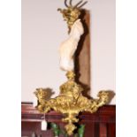 A 19th century gilt six-branch chandelier with leaf and vine decoration, 32" long approx