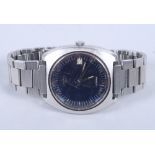 A Longines Ultratronic stainless steel wristwatch with blue enamel dial, baton numerals and date
