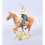 A Beswick Canadian mounted cowboy, impressed 1377 and black mark to base, 9" high