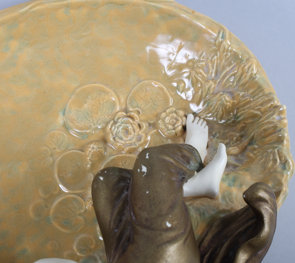 A Honenstein Art Nouveau table centre, formed as a girl sitting by a pond feeding a duck (damages - Image 6 of 8