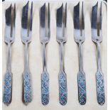 A set of six 1930s silver pastry forks by Liberty of London, handles decorated blue and green