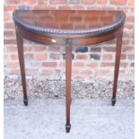 A walnut shape top occasional table, 21" wide, and a walnut semicircular fold-over top card table,