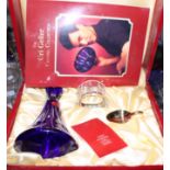 A Dickenson glass Uri Geller limited edition blue cut glass decanter and stand with spoon, in