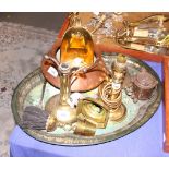 An Art Nouveau brass sprint kettle, on stand, a brass chamberstick, made from a WWII shell, and