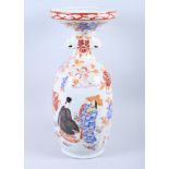 An early 20th century Kutani porcelain vase with flared rim and figure decoration, 17" high, on