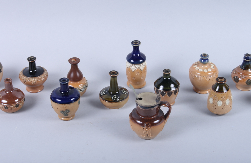 A collection of twelve Doulton Lambeth miniature stoneware sprig decorated vases, various designs, - Image 2 of 7
