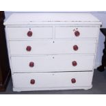 A painted pine chest of two short and three long drawers with knop handles, 42" wide