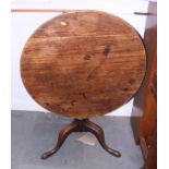 A 19th century mahogany tilt top occasional table, on turned column and tripod support, 31" dia