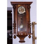 A Vienna type regulator wall clock, in polished as walnut case