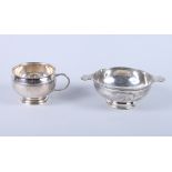 A George V silver two handled quaishe, 6" dia, together with silver Christening cup, on circular