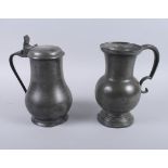 A pewter topped measure and one other pewter measure