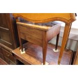 A 19th century mahogany commode stool with lift up lid, on square taper supports, 17 1/2" wide