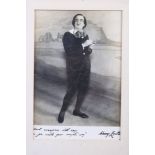 A photograph of Henry Lytton as Bunthorne in Patience, with facsimile inscription and signature