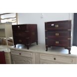 A pair of Indian hardwood and brass inlaid bedside chest of three drawers, on cabriole supports, 18"