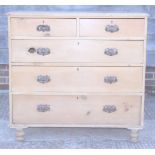 A waxed pine chest of two short and three long drawers, on turned supports, 42" wide