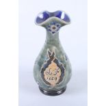 A Doulton Lambeth stoneware vase with incised decoration dated 1669, 5" high