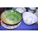 A Continental Delft plate (restored), a green glazed bowl, a green glass pedestal vase, a punch bowl