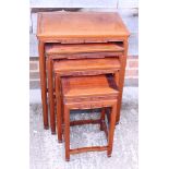 A nest of four Chinese hardwood occasional tables, largest 20" wide