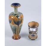 A Doulton Lambeth stoneware and slip decorated beaker with plated mounts, 5" high, and a Royal