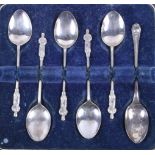 A set of five George V silver apostle spoons, with one additional spoon, 1 1/4 oz troy approx, in