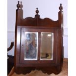 An Edwardian mahogany corner cupboard enclosed two mirror door, 18" wide
