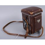 A mid 20th century Yashica-Mat Copal MXV camera, complete with leather case