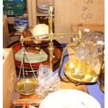 A set of early 20th century brass scales, on an oak and brass plinth base, 15 1/2" wide