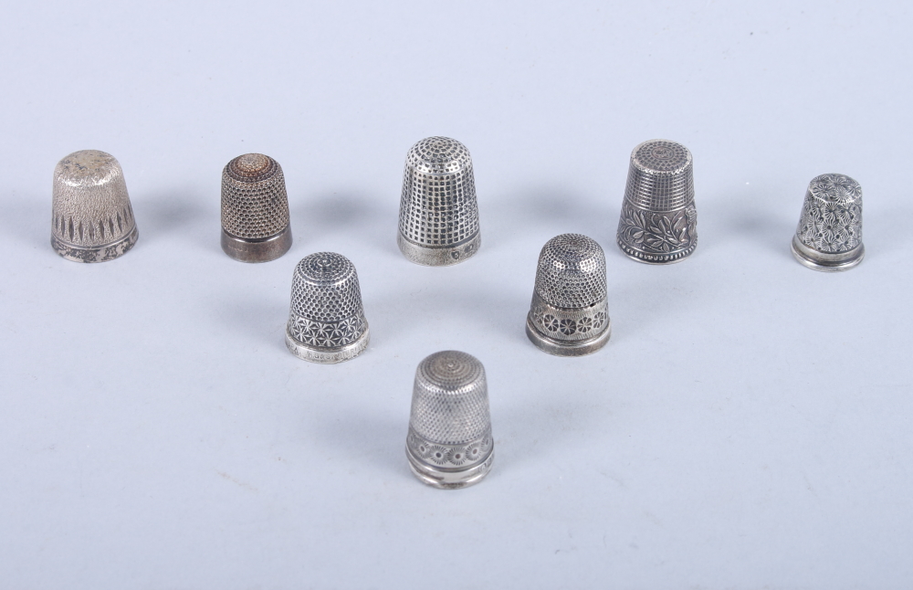 Eight silver thimbles, including one by Charles Horner