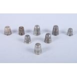 Eight silver thimbles, including one by Charles Horner