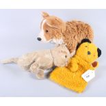 A Sooty hand puppet, an early 20th century toy cat with straw filled head and a toy corgi dog