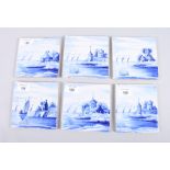 A set of six mid 20th century Dutch Delft pottery blue and white tiles, decorated canal scenes, 5"
