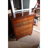 An Indian hardwood and brass inlaid chest of four long drawers, with lift up lid, 25" wide