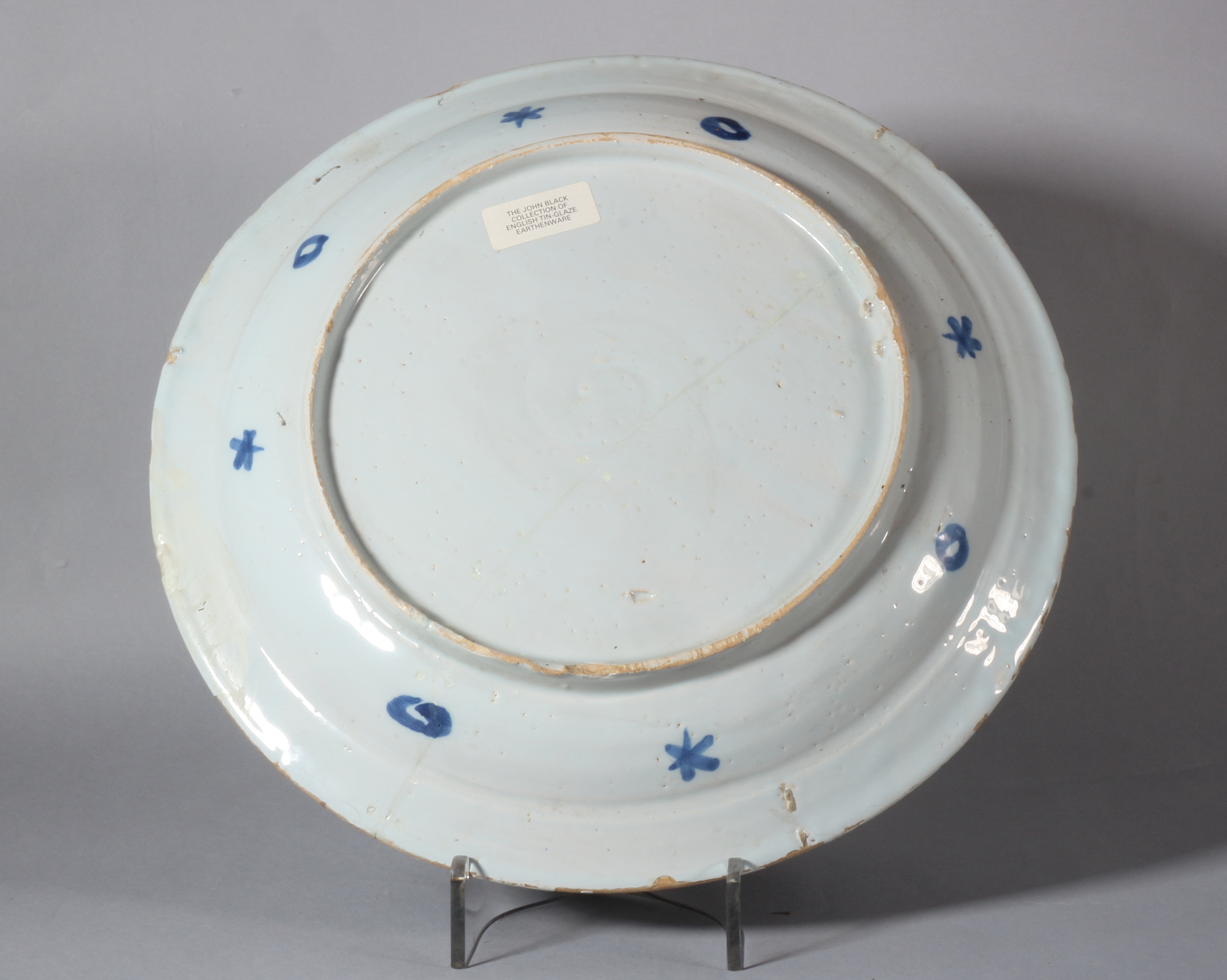 An 18th century Bristol? delft charger with peacock decoration, foot rim with two holes, 13" dia ( - Image 2 of 3