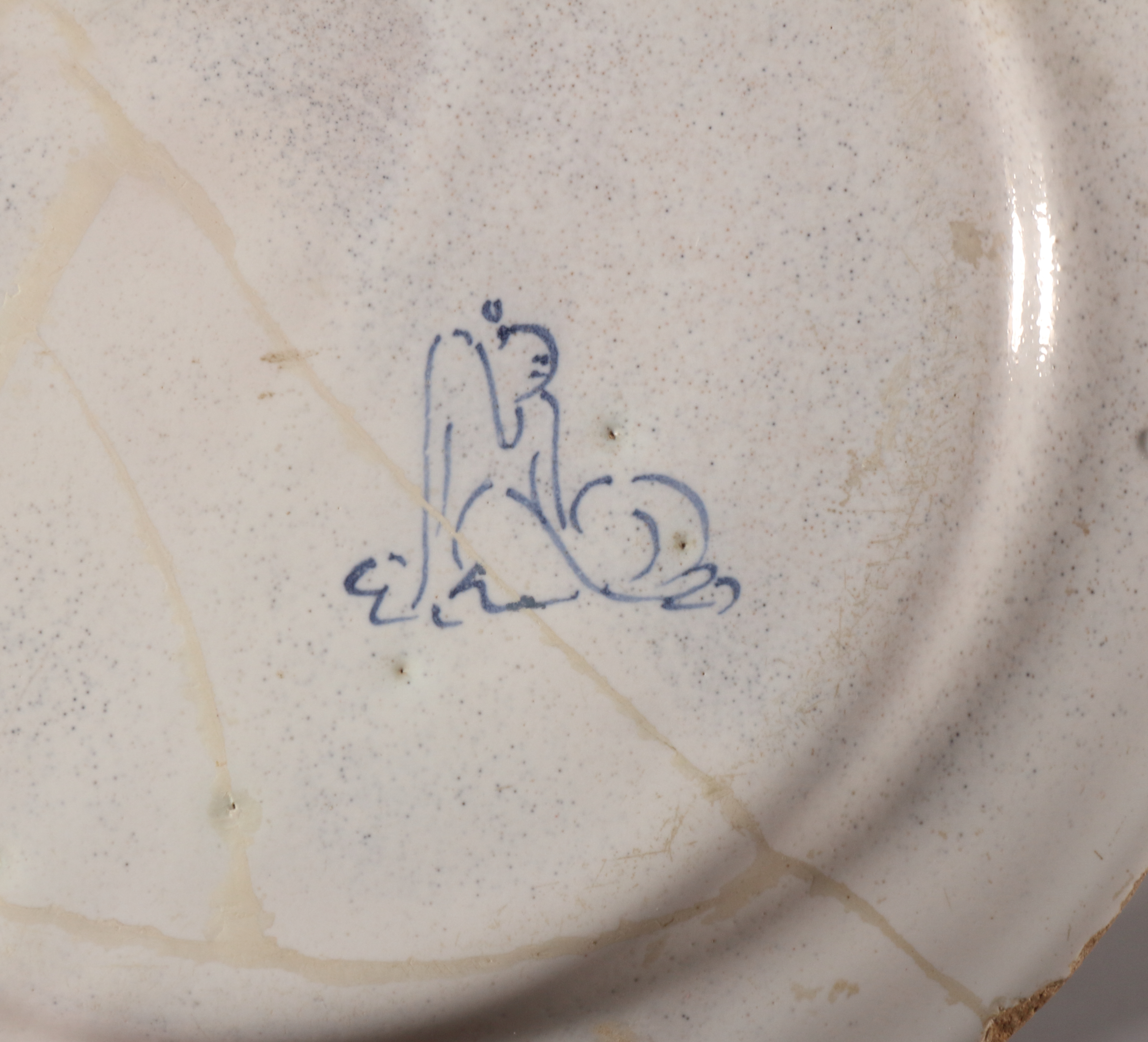 An 17th century London delft plate with chinoiserie landscape with seated figure decoration, - Image 3 of 3