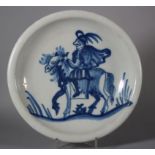 An 18th century Dutch delft shallow bowl with horse and rider decoration, 12 1/4" dia (old
