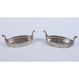 A pair of George V silver navette-shaped two-handle pierced butter dishes, 3.8oz troy approx