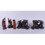 A Chinese bamboo cricket cage/censer, carved with figure and horses in forest landscape, a pair of