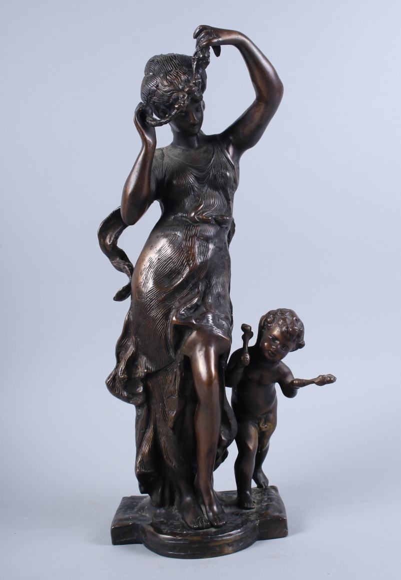 A bronze model, dancing nymph and putti, 19" high