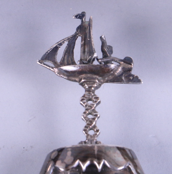 A Dutch silver caddy spoon, decorated boating scenes, import marks Burthold Muller, two miniature - Image 3 of 6