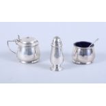 A George V silver three-piece cruet set