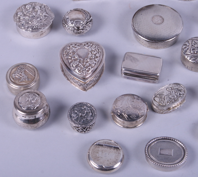 A collection of silver and white metal pill boxes, mostly with embossed decoration, 18.2oz troy - Image 2 of 5