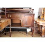 A 1920s mahogany bowfront sideboard, fitted two drawers and cupboards, on cabriole supports, 60"