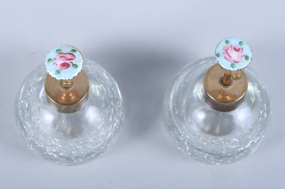 A pair of early 20th century ice glass scent bottles, each atomiser with guilloche enamel of a - Image 2 of 2