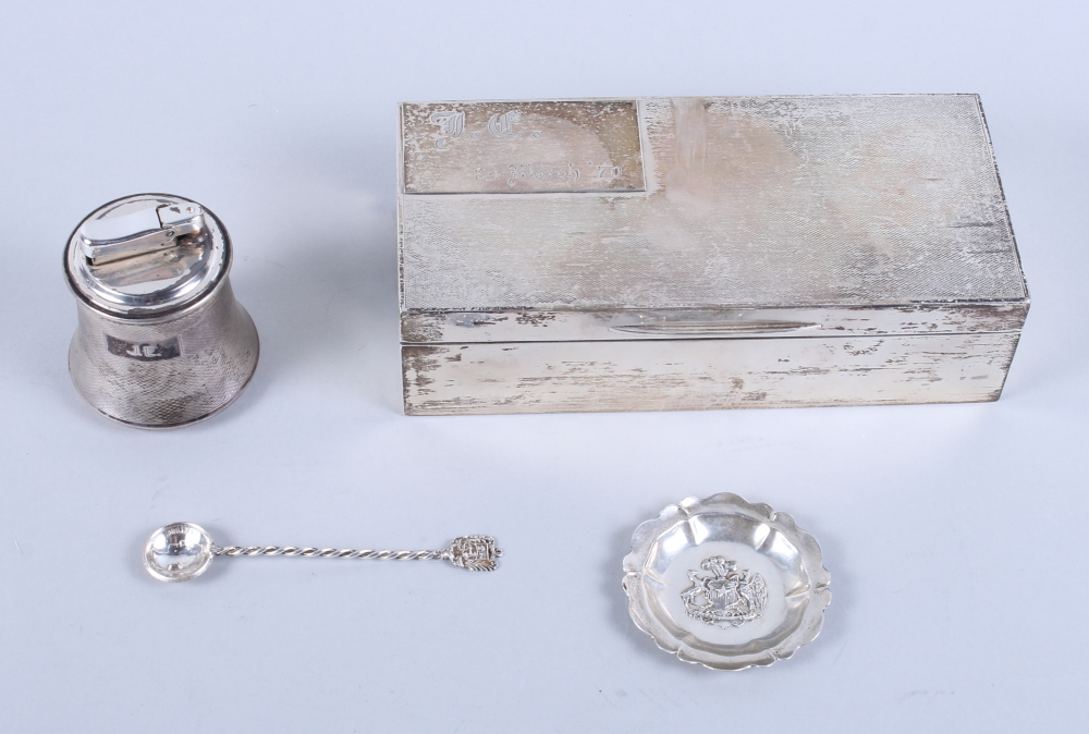 A mid 20th century silver mounted cigarette box, 7 1/2" long, a silver engine turned waisted table